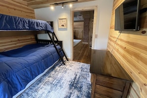 Sleep comfortably in our single over double bunk beds.