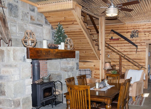 Enjoy a heartwarming dinner by the fireplace.