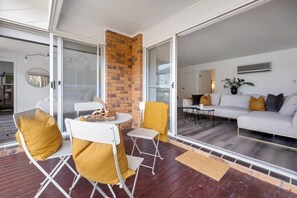 Balcony with BBQ and stunning water views