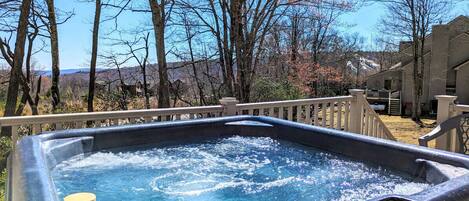 Hot tub on the deck overlooking the lake and mountains!
