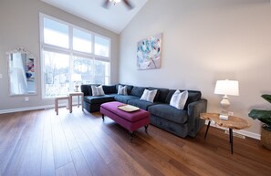 Sink into the comfy sofa in the spacious sun-filled living room.