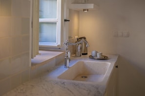 Traditional limestone kitchen sink