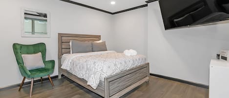 Bedroom area with a queen-size bed