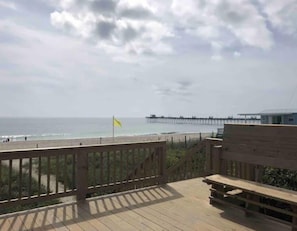 Deck with beach access for private parking area