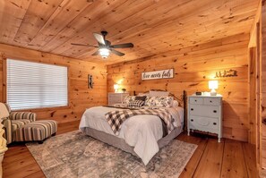 Master bedroom on first floor with king bed