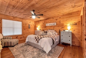 Master bedroom on first floor with king bed