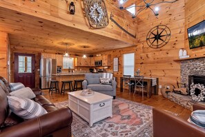 Cozy up by the fire in this inviting living room.