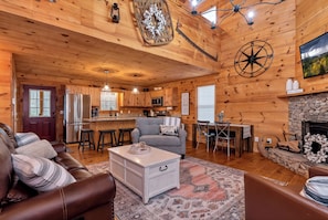 Cozy up by the fire in this inviting living room.
