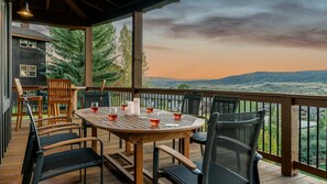 Enjoy happy hour out on the main level deck