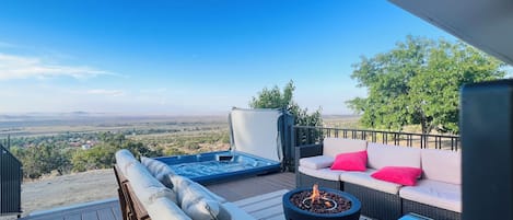 Patio with amazing views, hot tub, fire pit and comfy furniture 