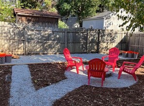 Backyard - Our apartment features a backyard where you can relax in the evening. There's a fire pit perfect for making s'mores and having meaningful conversations with your loved ones.