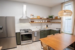 Kitchen - Our dining area is right next to the kitchen, making it convenient.