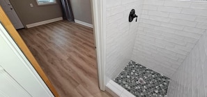 Brand NEW shower and floors.