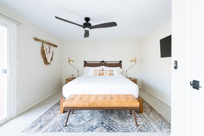 California King suite with Roku TV & handmade macrame by local artist