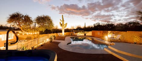 view from the hot tub of our beautiful saguaro