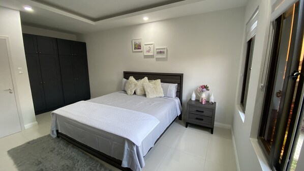 Master bedroom with king-sized bed