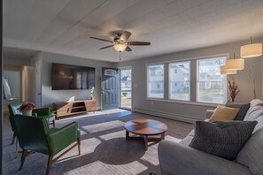 Natural light floods the living room.