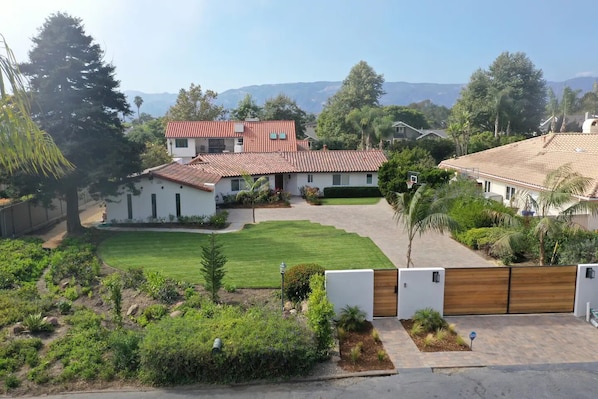 Gated and private with serene grounds throughout.