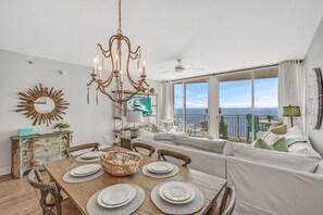 Gulf Front Dining! This beautifully remodeled and decorated home features stunning views of the Gulf of Mexico and Panama City Beach through floor to ceiling windows.