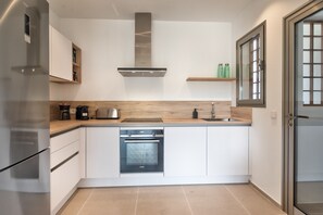 Fully equipped kitchen open to the living room