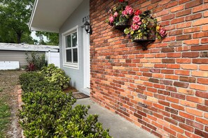 Front entryway, covered to protect from the elements