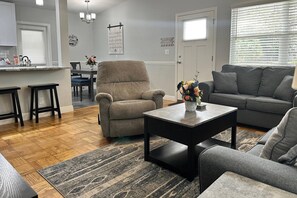 Seating for six at the dining table and another 2 at the breakfast bar