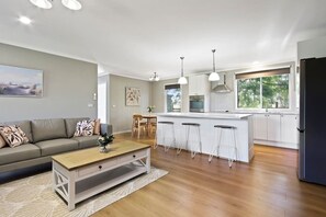 Lounge room and kitchen.