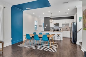 Eclectic decor throughout downstairs living/dining/kitchen open space