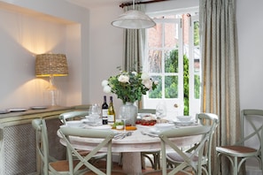 The dining area with french doors leading to the garden
