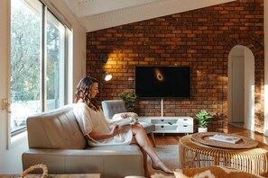 Finally begin that book you've been meaning to read and relax in the comfortable lounge room.