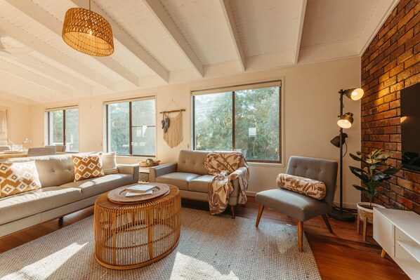Just off the dining area is the lounge room with seating for six to kick back, relax and watch a movie on the smart TV.