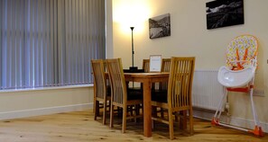 dining room  at Mid Wales Holiday Lets Old Drapers Apartment