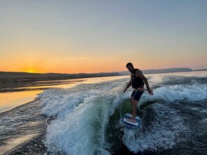 Wake surf at sunset