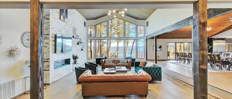 Living room with gorgeous lake view as you enter through the main door 