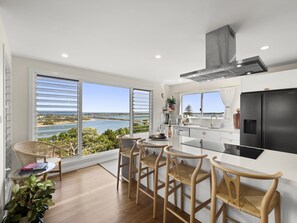 Modern Coastal Kitchen with sweeping views of Shaws Bay