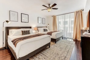Bedroom featuring 2 cozy Queen sized bed