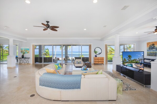 Living area with ocean views throughout.