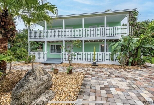 front of house.  downstairs and upstairs unit. This building is a duplex. 