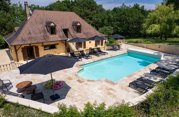 Swimming pool backside of house