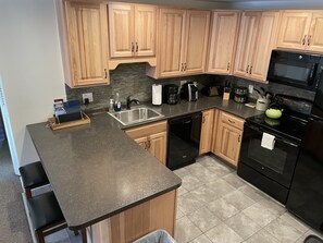 Updated kitchen with breakfast bar.