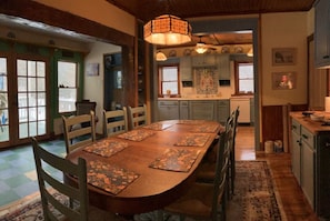 Country kitchen with table seating 8 