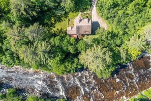 Listen to the West River flow while relaxing on your vacation