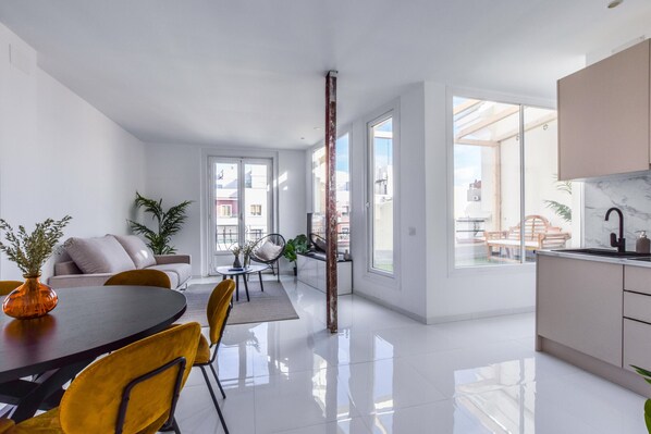 Main view of the dining room with terrace and bottom balcony