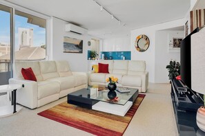 Comfortable lounge area for watching your favourite shows after a long day.