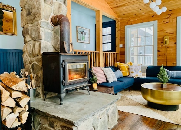 Wood-burning stove with firewood provided