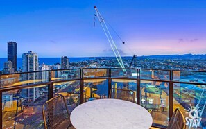 Spacious balcony with the ocean and the city views