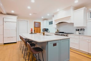 Chef's kitchen with Viking Range and Subzero Refrigerator - Perfect for large family meals.