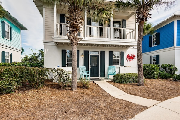 Front of house, gas grill provided for your grilling needs.

