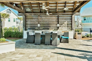 Private lounge spaces with tables and grills for the perfect relaxing day.