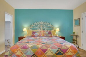 The master bedroom, inspired by the colors of the Caribbean.